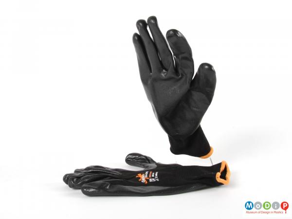 Side view of a pair of gloves showing the grippy surface.