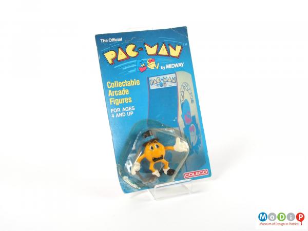 Front view of a figurine showing the packaging.