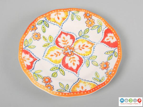Front view of a plate showing the printed decoration.