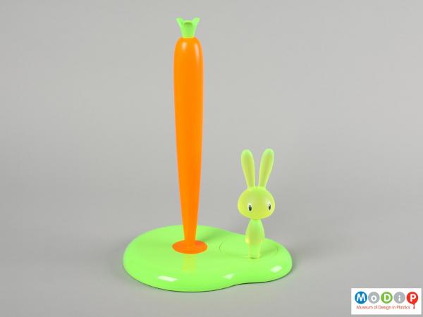 Side view of a kitchen roll holder showing the tall thin carrot and translucent rabbit.