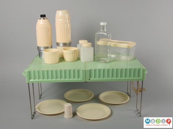 Side view of a picnic set showing the table and the contents.