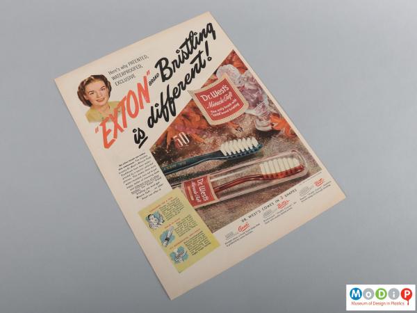 Front view of an advert showing the colour printed image of toothbrushes.