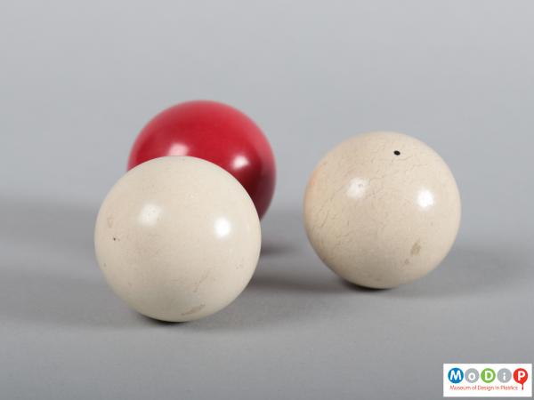 Side view of a ball set showing the three balls.