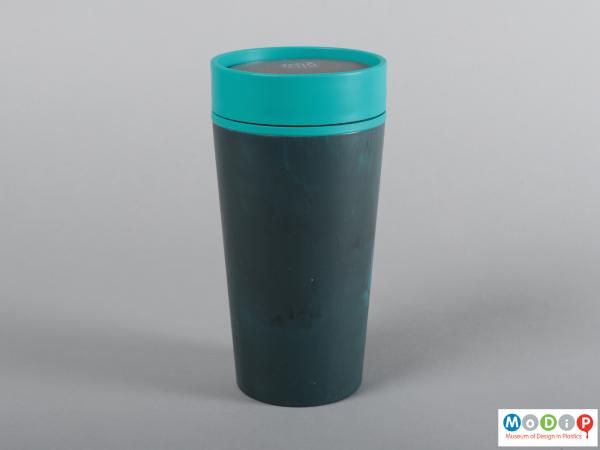 Side view of a travel cup showing the smooth tapered sides.