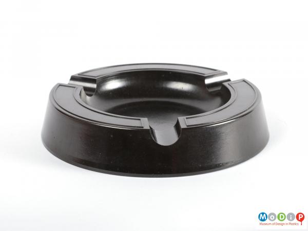 Side view of an ashtray showing the tapered sides.