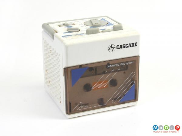 Front view of a radio cassette player showing the cassette cover.