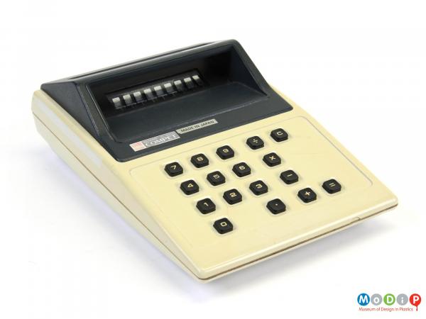 Top view of a Sharp EL-8001 calculator showing the screen shade and the square buttons on the top.