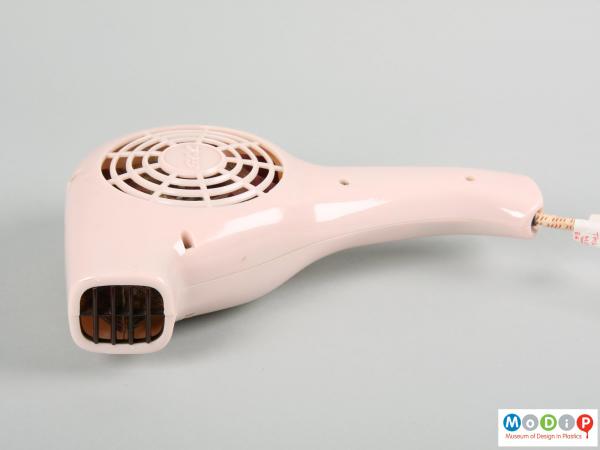 Front view of a GEC hairdryer showing the smooth surfaces and the grill at the front of the nozzle.