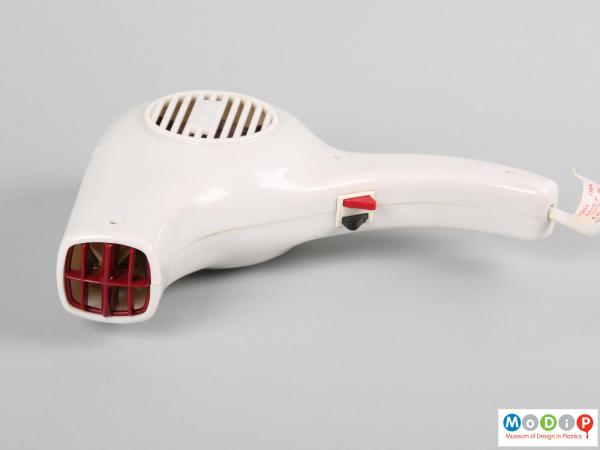 Front view of a white Pifco hairdryer showing the red grill at the front of the nozzle.
