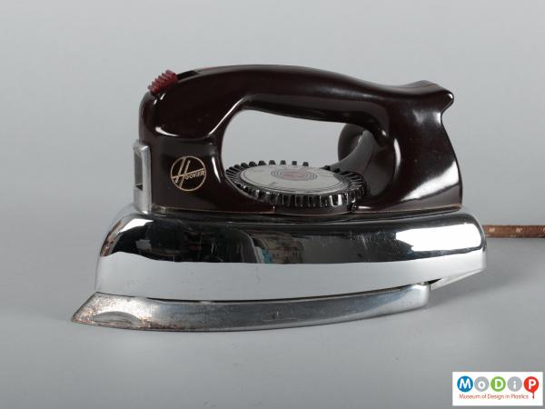 Side view of an iron showing the handle.