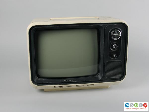 Front view of a television showing the black screen surround and dial controls.