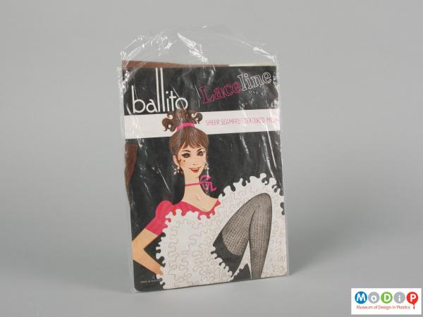 Front view of a packet of stockings showing the printed design of a can-can dancer.