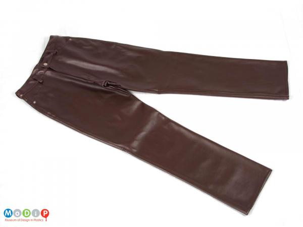 Front view of a pair of trousers showing the plain fabric.