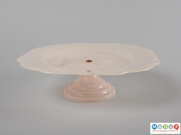 Side view of a cake stand showing the tapering base.