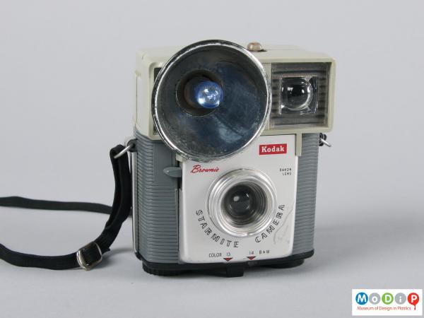 Front view of a camera showing the large flash.