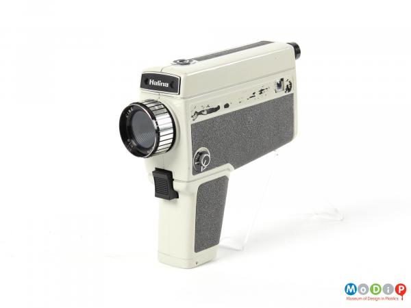 Side view of a super 8 movie camera showing the handle and body.