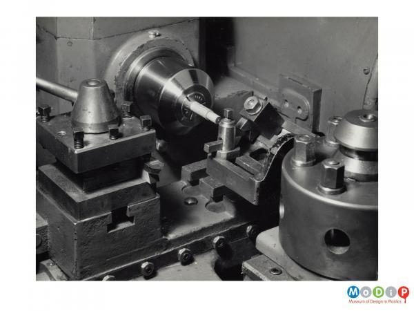 Scanned image showing a lathe.