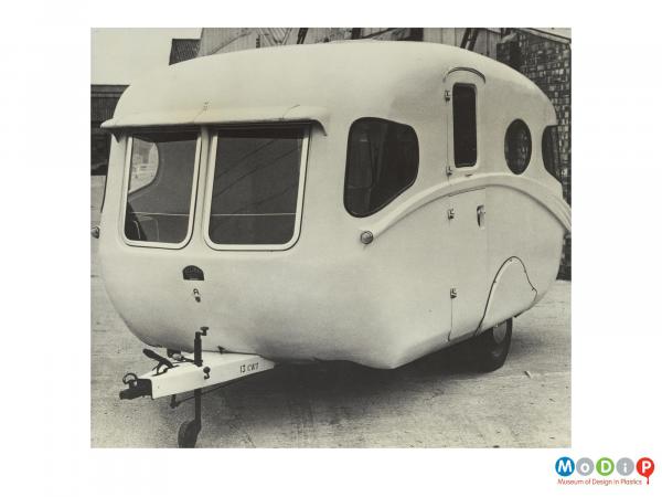 Scanned image showing a caravan.