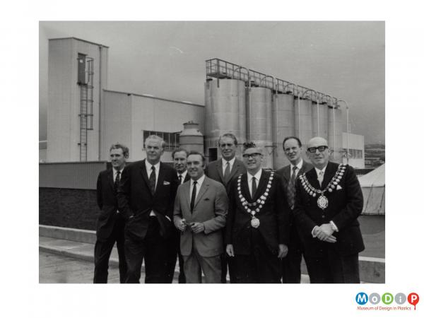 Scanned image showing a mayoral visit to a factory.