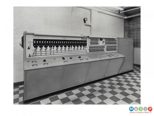 Scanned image showing a large console panel.