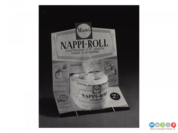 Scanned image showing the packaging for a roll of material for nappies.