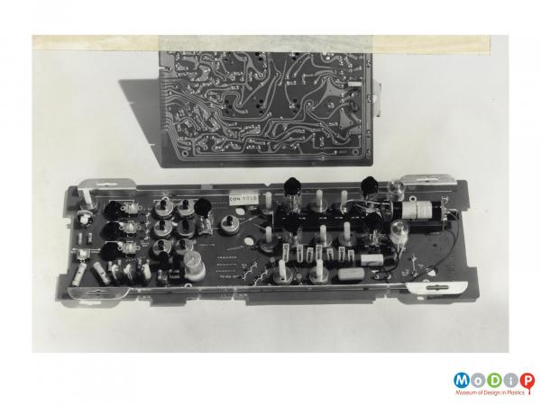 Scanned image showing a circuit board for a TV.