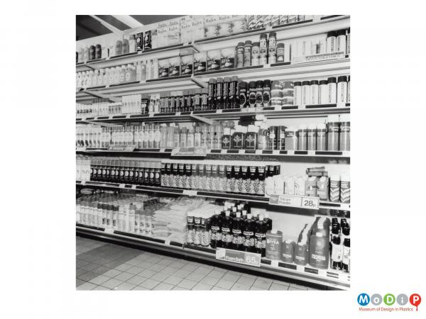 Scanned image showing a set o stacked shop shelves.