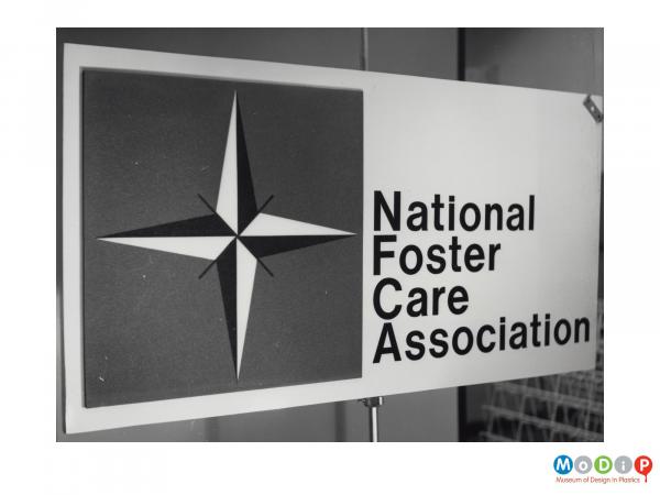 Scanned image showing panel made of Plastazote used to adverstise the National Foster Care Association.