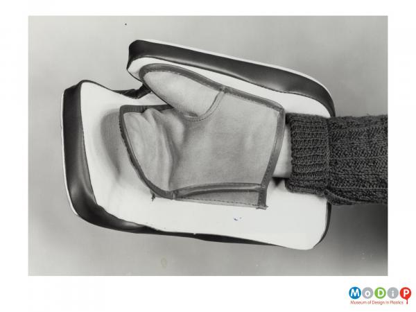 Scanned image showing a padded glove.