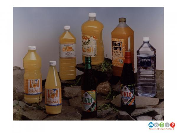 Scanned image showing a range of squash and spring water bottles.