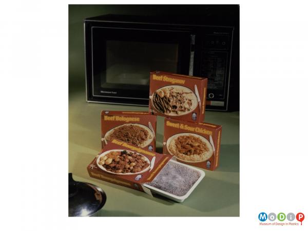 Scanned image showing a group of microwave meals.