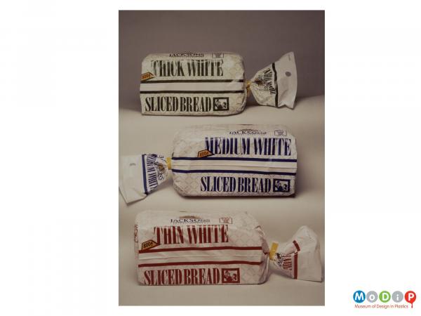 Scanned image showing a range of 3 breads in white plastic bags.
