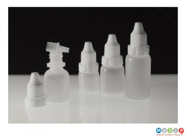 Scanned image showing a range of 4 dropper-type bottles.