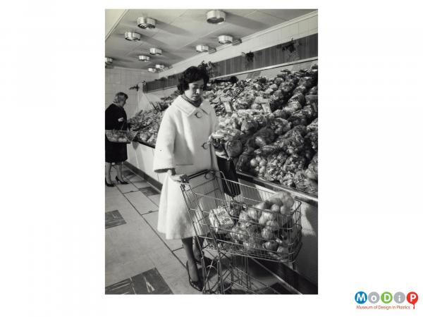 Scanned image showing vegetables packed in a supermarket.