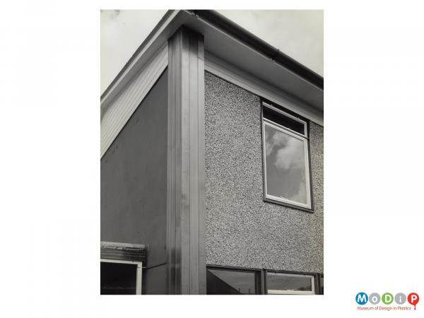 Scanned image showing a house with cladding.