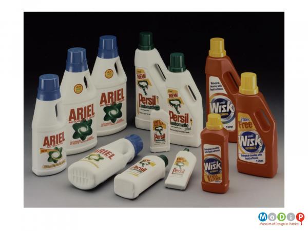 Scanned image showing a range of Ariel, Persil and Wisk bottles.