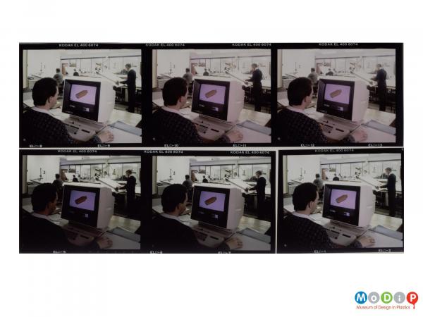 Scanned image showing a contact sheet of 6 images of a male worker designing a bottle on a computer.