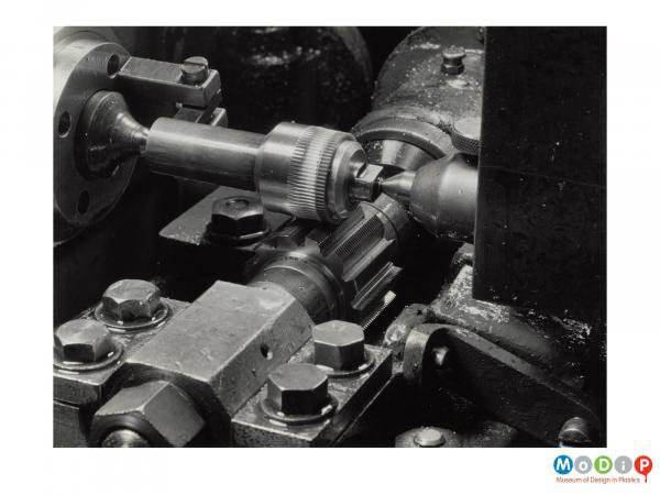 Scanned image showing gear wheel production.