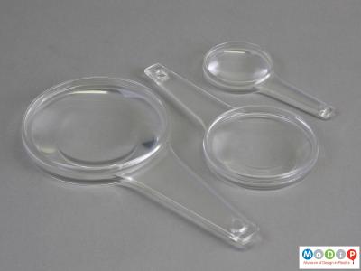 Top view of a set of magnifying glasses showing the three sizes.