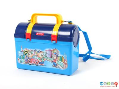 Side view of a Lion Star lunch box showing the flask and lunch box attached.