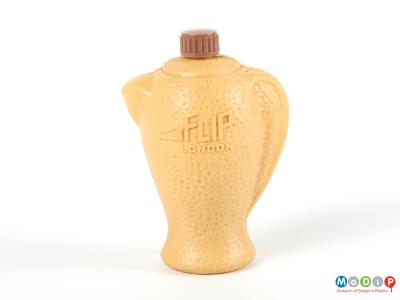 Front view of a Flip syrup bottle showing the moulded shape of a spout and handle.