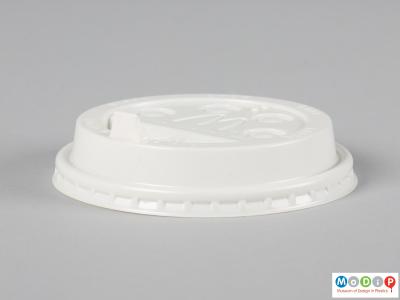 Side view of a hot drink lid showing the stright sides and flexible seal.