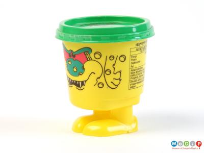 Side view of a Fiendish Feet pot showing the moulded feet and printed features.