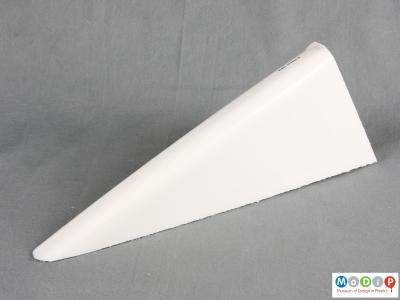 Side view of a surfboard section showing the outer shell.