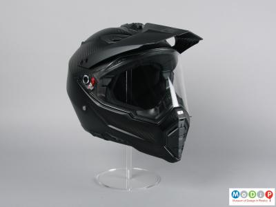 Front view of a helmet showing the peak and visor.