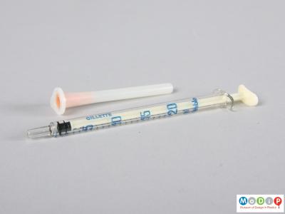 Side view of a syringe showing the demarcations.